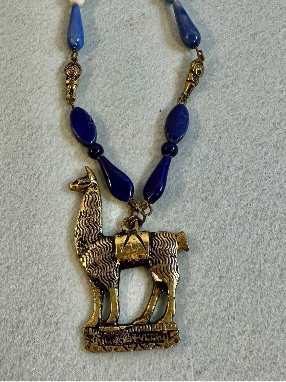 Llama pendant handcrafted metal  Blue gradient beads dark cord Necklace